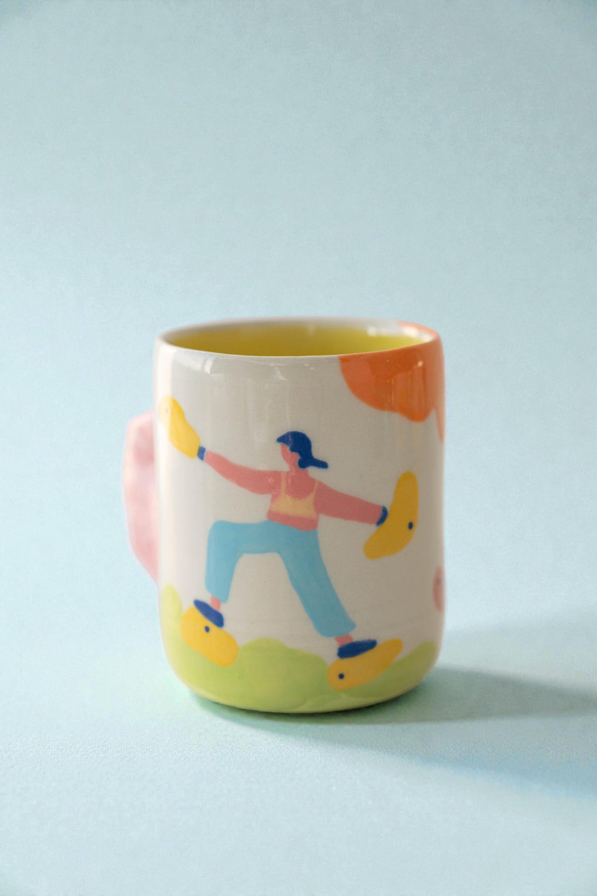 Colorful rock climbing mug
