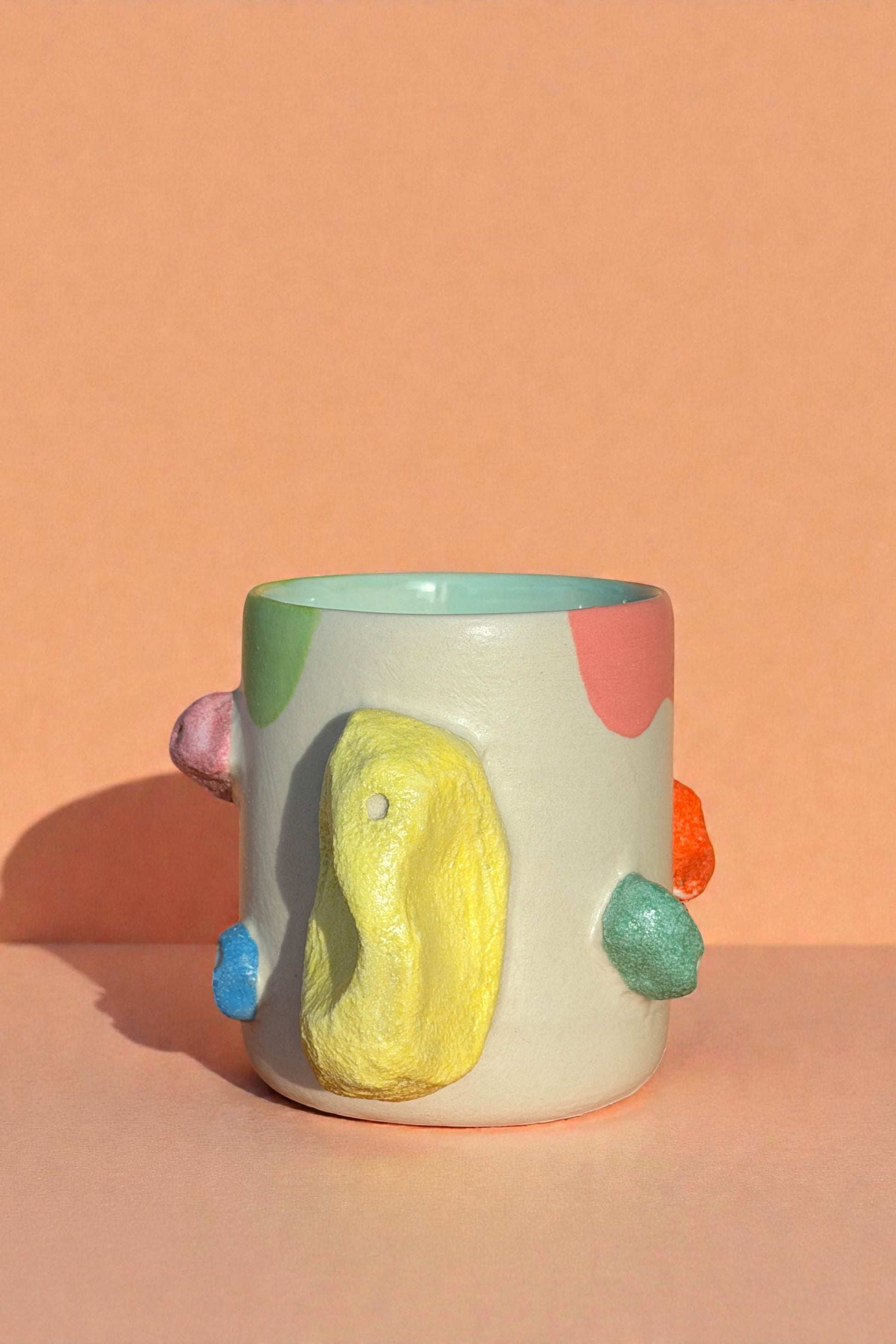 Rocking climbing mug with matte finished galze. The handle mimic rock touch feel