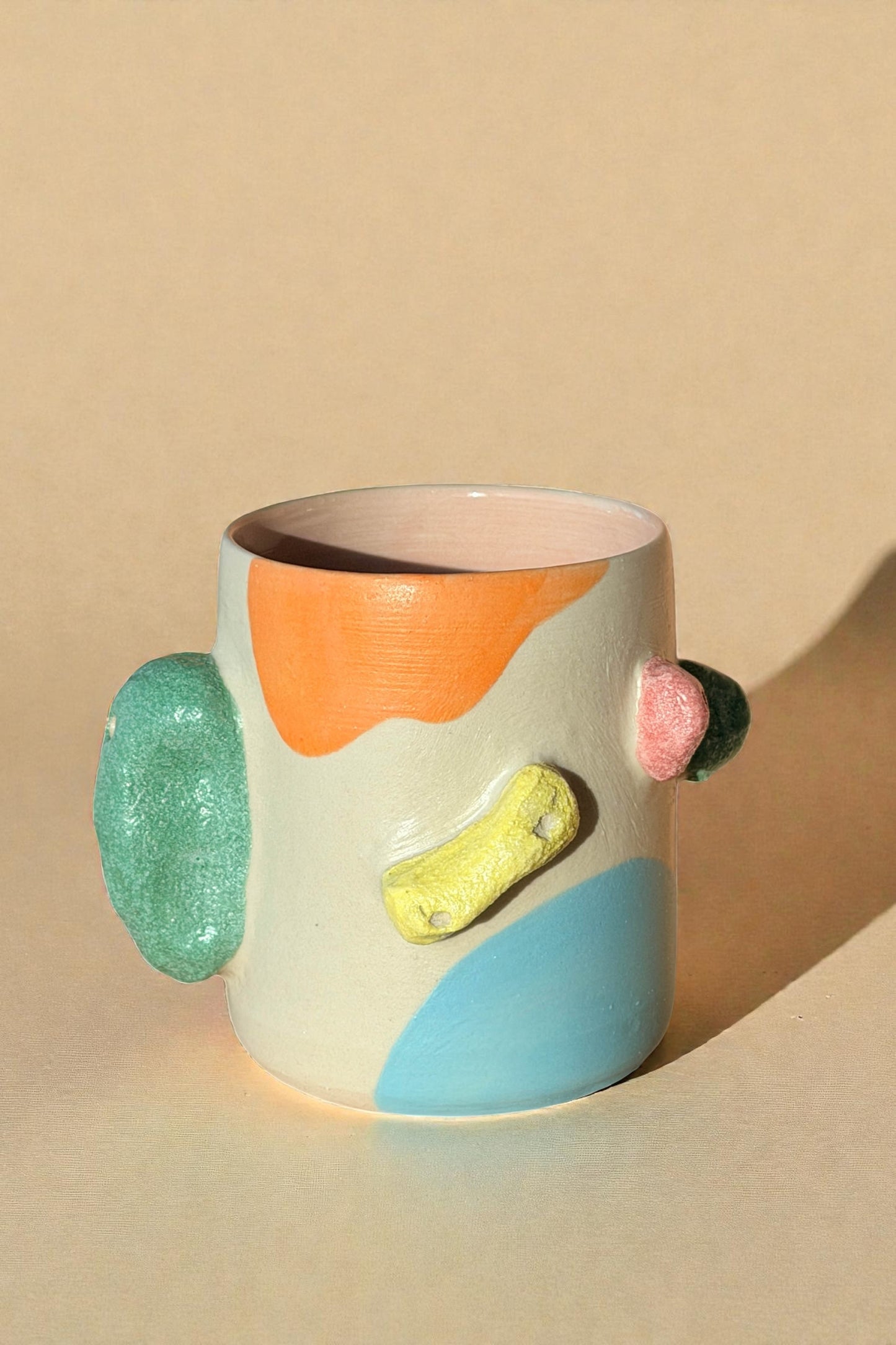 Rocking climbing mug with matte finished galze. The handle mimic rock touch feel