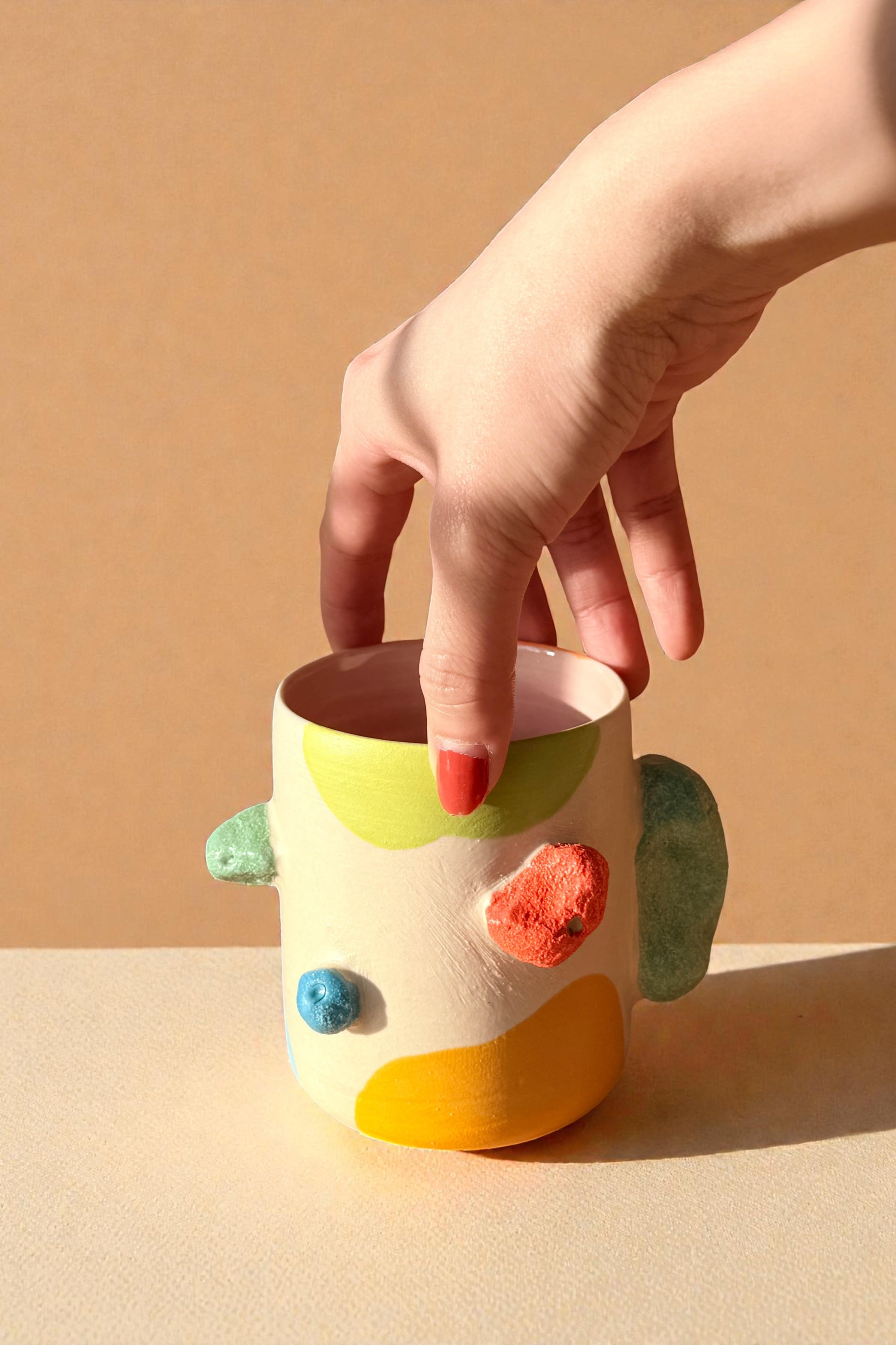 Rocking climbing mug with matte finished galze. The handle mimic rock touch feel